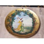 A 20TH CENTURY TERRACOTTA CHARGER WITH HANPAINTED SCENE DEPICTING MAIDENS SIGNED L CEISSIER 43.5CM