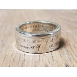 A SILVER MORGAN 1884 DOLLAR RING SIZE Z 22.3G