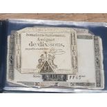 A COLLECTION OF OLD FRENCH BANKNOTES IN ALBUMN
