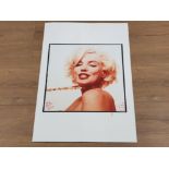 A LIMITED EDITION SIGNED PHOTOGRAPH BY BERT STERN MARILYN MONROE STRETCHING THE BEADS 1962 LAST