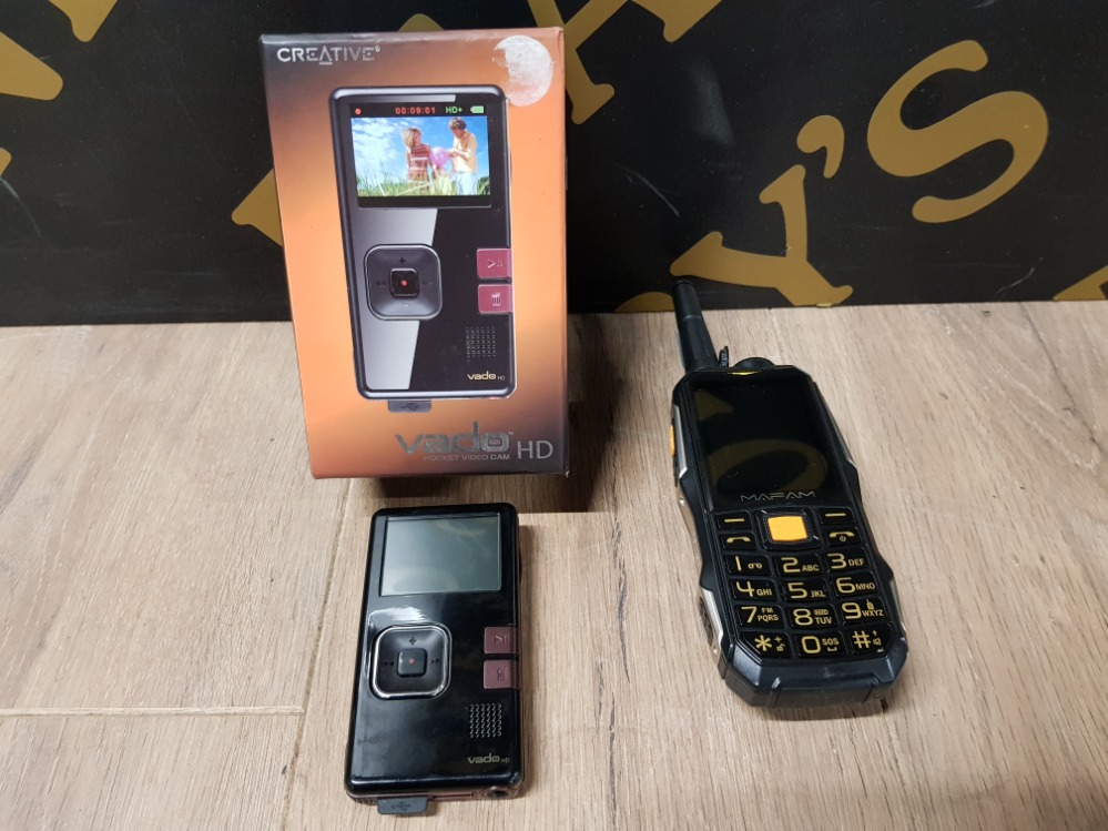 A MAFAM M2 2G FEATURE PHONE AND A VADO HD POCKET VIDEO CAM BY CREATIVE BOXED