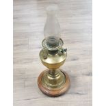 BRASS OIL LAMP WITH GLASS SHADE AND BRASS AND WOOD STAND