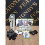 A WHITE XBOX 360 TOGETHER WITH 4 CONTROLLERS AND 7 GAMES INC CALL OF DUTY WORLD AT WAR NEED FOR