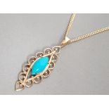 9CT YELLOW GOLD TURQUOISE ORNATE PENDANT WITH CURB CHAIN, 5.3G