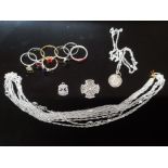 SILVER JEWELLERY TO INCLUDE 6 CHAINS 7 DRESS RINGS A CELTIC DESIGN BROOCH A BRADFORD CHARM AND A