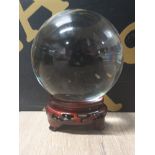 A FORTUNE TELLING GYPSY BALL ON WOODEN BASE IN ORIGINAL BOX