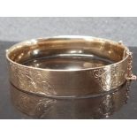 9CT GOLD WITH BRONZE CORE BANGLE BY LAWSON WARD AND GAMMAGE LAGARMIC WITH SAFETY CHAIN HALF ETCHED