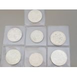COLLECTION OF 7 SILVER COINS INCLUDES 5 HALF CROWNS DATED 1939, 1941, 1944, 1945 AND 1946 ALSO