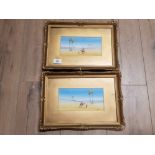 A PAIR OF 20TH CENTURY WATERCOLOURS BY F VARLEY CAMEL RIDERS IN THE DESERT SIGNED 9.5 X 20CM