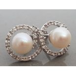 9CT WHITE GOLD PEARL AND DIAMOND STUDS, 2.8G