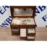 JEWELLERY BOX PLUS CONTENTS INCLUDES BUTTERFLY EARRINGS AND BADGE ETC