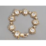 9CT YELLOW GOLD CUBIC OVAL STONE BRACELET, 29.4G