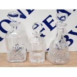 3 ASSORTED CRYSTAL DECANTERS WITH STOPPERS