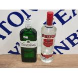 A 70CL BOTTLE OF GORDON'S SPECIAL DRY LONDON GIN TOGETHER WITH A 70CL BOTTLE OF SMIRNOFF VODKA