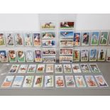 SET OF 50 OGDEN CIGARETTE CARDS, CHAMPIONS OF 1936 ISSUED IN 1937, IN EXCELLENT CONDITION