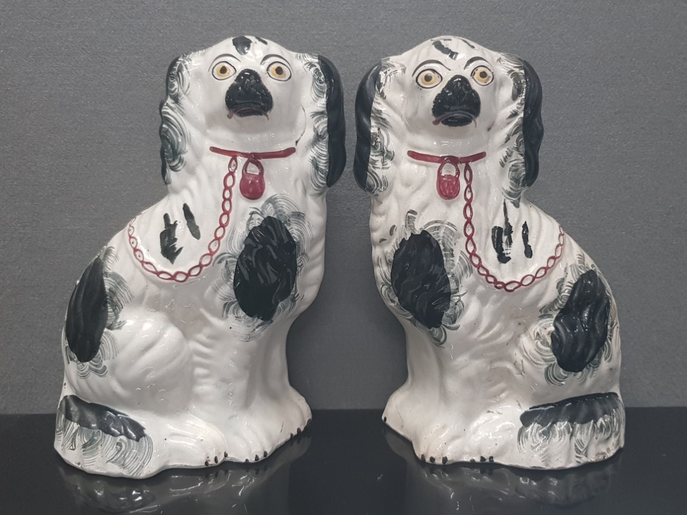 A PAIR OF ANTIQUE STAFFORDSHIRE DOGS 10 INCHES