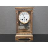 A 19TH CENTURY FRENCH BRASS AND CLOISONNE MANTLE CLOCK WITH ENAMEL ARABIC DIAL AND BEVELLED GLASS