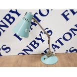 A RETRO DESK LAMP IN TURQUOISE