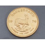 22CT FINE GOLD SOUTH AFRICAN KRUGERRAND COIN, DATED 1974 AND 1OZ IN WEIGHT