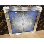 A GLASS OVERLAY PRINT SILVER STARBURST 68.5 X 68CM