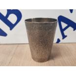 A 19TH/20TH CENTURY INDIAN WHITE METAL BEAKER WITH FLORAL DECORATION 159.5G
