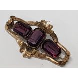 VICTORIAN PURPLE STONE AND GOLD PLATED BROOCH