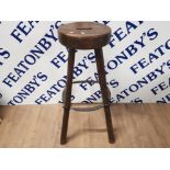 EARLY 20TH CENTURY HEAVY WOOD AND METAL WORKSHOP OR FACTORY STOOL 74CM BY 27CM