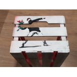 A BANKSY THEMED WOODEN TOY CRATE