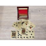 A LUXURIOUS SET OF 24CT GOLD PLAYING CARDS IN NICELY PRESENTED DISPLAY BOX