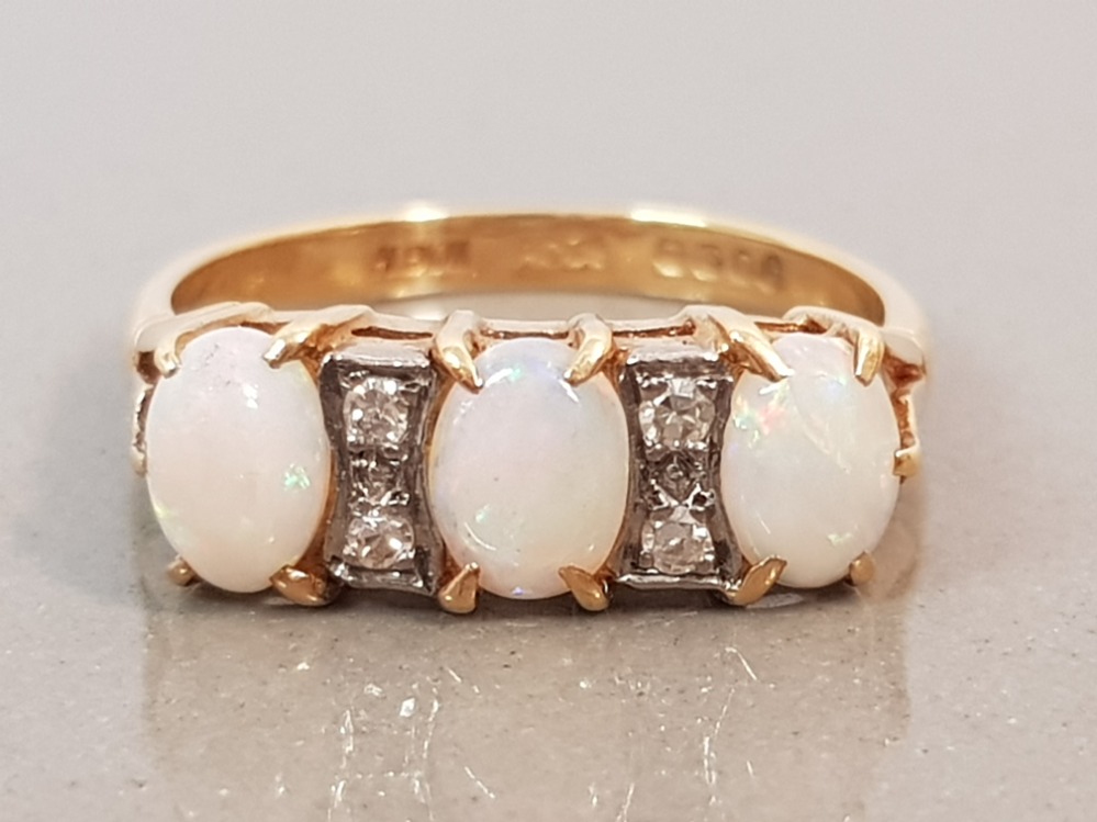 18CT GOLD THREE STONE OPAL RING SET WITH FOUR DIAMONDS 3.5G SIZE M1/2