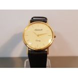 9CT GOLD INGERSOLL QUARTZ WATCH WITH BLACK LEATHER STRAP