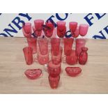 A LARGE QUANTITY OF ANTIQUE CRANBERRY GLASS WARE SOME WITH CLEAR GLASS HANDLES