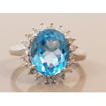 9CT WHITE GOLD BLUE STONE AND DIAMOND CLUSTER RING APPROXIMATELY .50CT 5.3G SIZE R