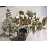 A LARGE QUANTITY OF BRASS MANTLE PIECE ORNAMENTS INC LIONS PEACOCKS ETC