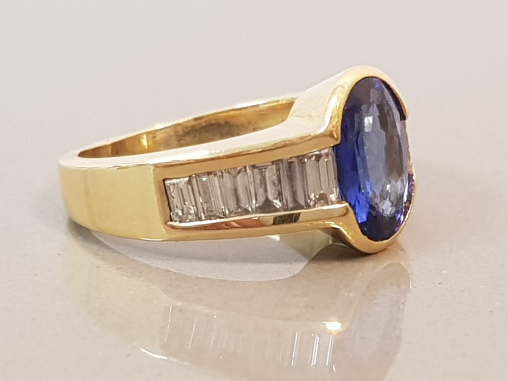 18CT GOLD BLUE OVAL STONE AND BAGUETTE DIAMOND RING 10.2G SIZE P1/2 - Image 2 of 2