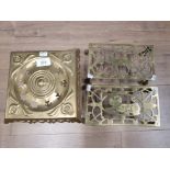 THREE VICTORIAN BRASS TRIVETS ONE IN THE MANNER OF ERNEST GIMSON