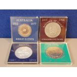 FOUR CASED UNCIRCULATED COINS INCLUDES COMMEMORATIVE CROWN BAILIWICK OF JERSEY