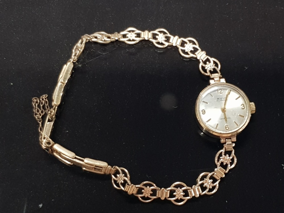 VINTAGE LADIES 1964 AVIA WATCH WITH SOLID 9CT GOLD CASE AND 12CT ROLLED GOLD STRAP IN GOOD WORKING