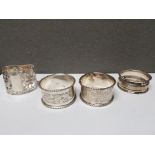 FOUR SILVER NAPKIN RINGS INCLUDING A PAIR 62.8G