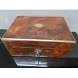AN EARLY VICTORIAN ROSEWOOD AND BRASS INLAY VANITY BOX OPENING TO REVEAL SILVER PLATED GLASS BOTTLES