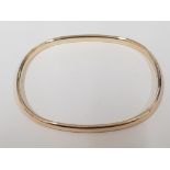 9CT GOLD OFF ROUND, RECTANGULAR BANGLE WITH BOX, 4.8G