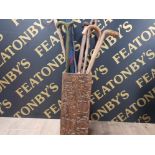 MOULDED ETHNIC STICK STAND 7 PLAIN AND FIGURAL WALKING STICKS