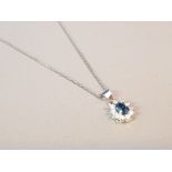 BLUE STONE AND CZ PENDANT ON SILVER CHAIN