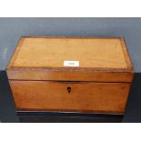 A VICTORIAN INLAID SATIN WOOD TEA CADDY OPENING TO REVEAL COMPARTMENTS AND CUT GLASS BOWL WITH