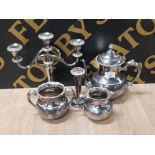 A LOT OF SILVER PLATED ITEMS TO INCLUDE TEAPOT CANDELABRA ETC