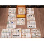 A LARGE QUANTITY OF MICROSCOPE SLIDES CONTAINING PLANTS, SEEDS ETC, HOUSED IN 12 TRAYS AND IN