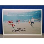 SIGNED 1966 WORLD CUP FINAL 12X8 COLOUR PICTURE, SHOWS ACTION SHOT OF GEOFF SHOOTING FOR ONE OF