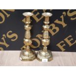 A PAIR OF BRASS CORONATION 1902 CANDLESTICKS 31.5CM