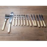 A SET OF STAINLESS STEEL AND IVOREX FISH KNIVES FORK AND SERVERS BY WALKER AND HALL