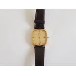 9CT YELLOW GOLD ETERNA WATCH WITH BROWN LEATHER STRAP
